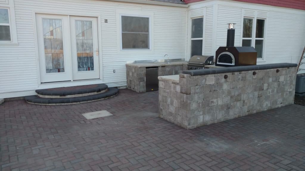 Luxury outdoor kitchen in landscaped garden